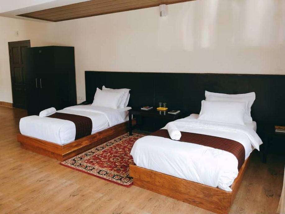 Pemaling Villa Thimpu Rom bilde